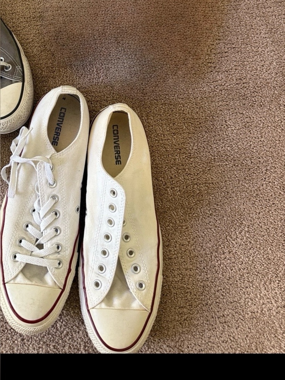 One pair of Converse  men Low Top Sneakers - White   $25.00